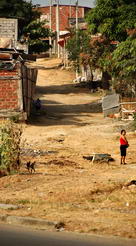 Road into a barrio near the work site