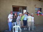 Some of the GV Team members in front of Shale's house at the dedication