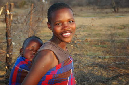 Girl and child in a small village outside of Molepolole