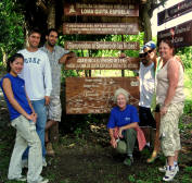 Volunteers in front of National Park sign