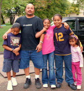 Man with four children