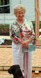 Woman in a dress on the construction site